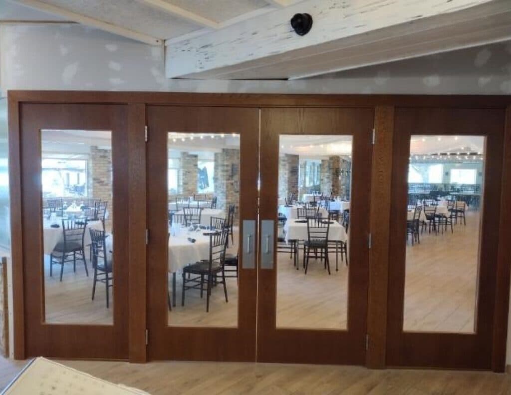 High-quality commercial wood door installed in a professional office building